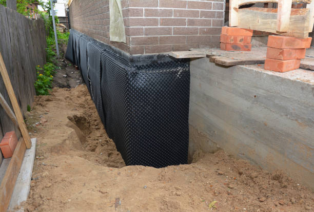 Happy homeowners after waterproofing job in Rockvale
